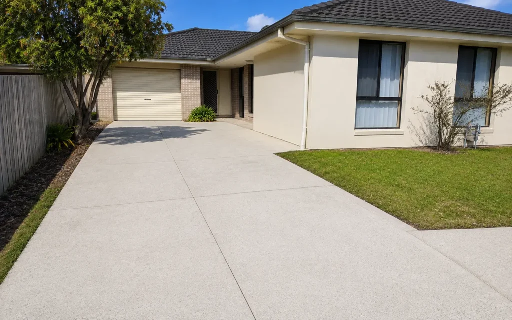 AFTER: same driveway cleaned to an even, like-new finish